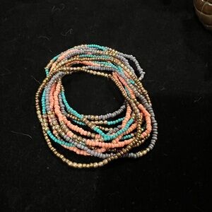Trades of Hope multicolored stretch small beaded bracelets-12 in total